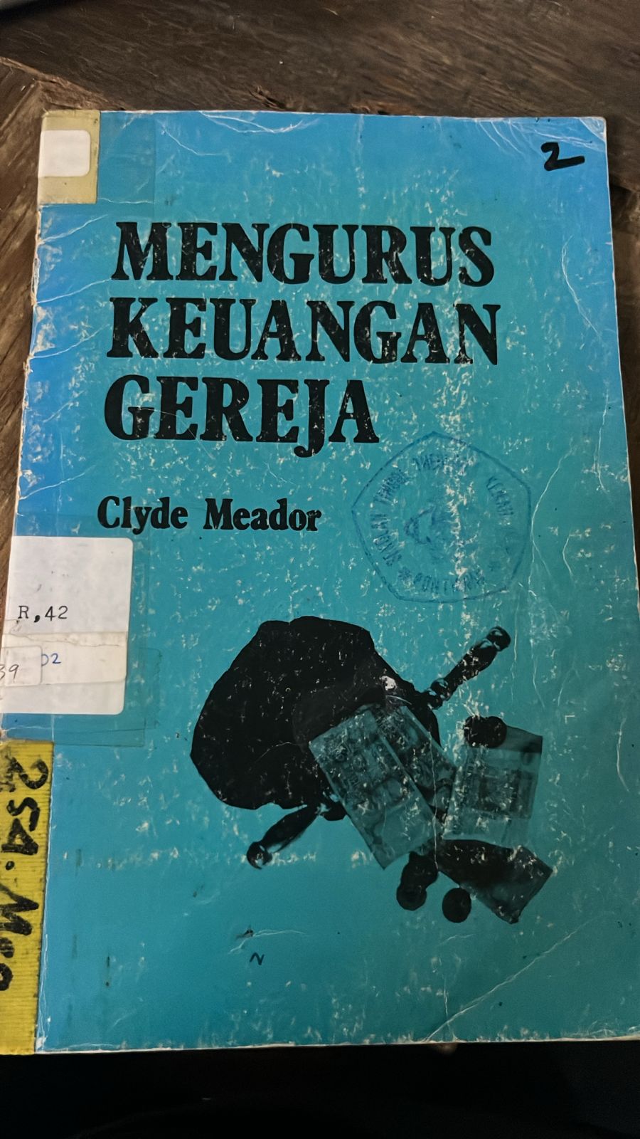 Cover buku Mengurus Keuangan Gereje