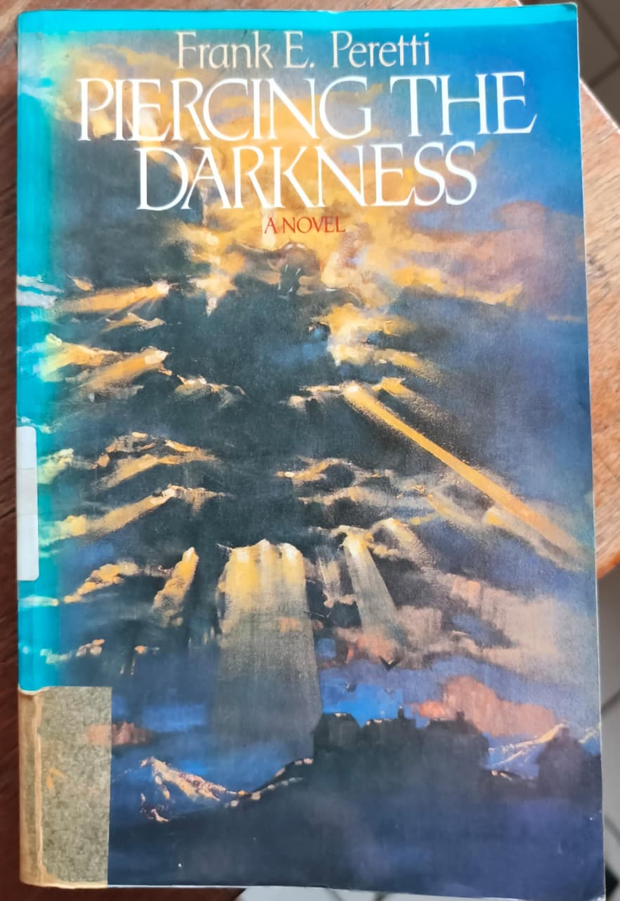 Cover buku PIERCING THE DARKNESS A NOVEL